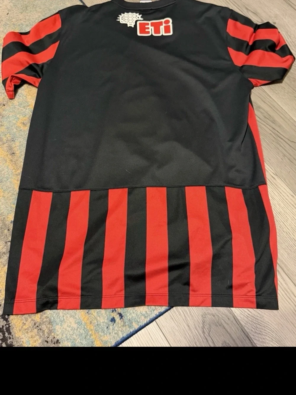 Nike Red and Black Striped Soccer Jersey with ETI Logo